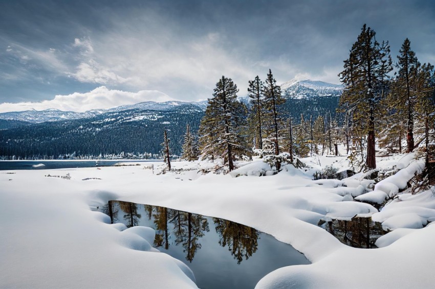 Snow-Covered Mountain and River: Serene Nature Photography